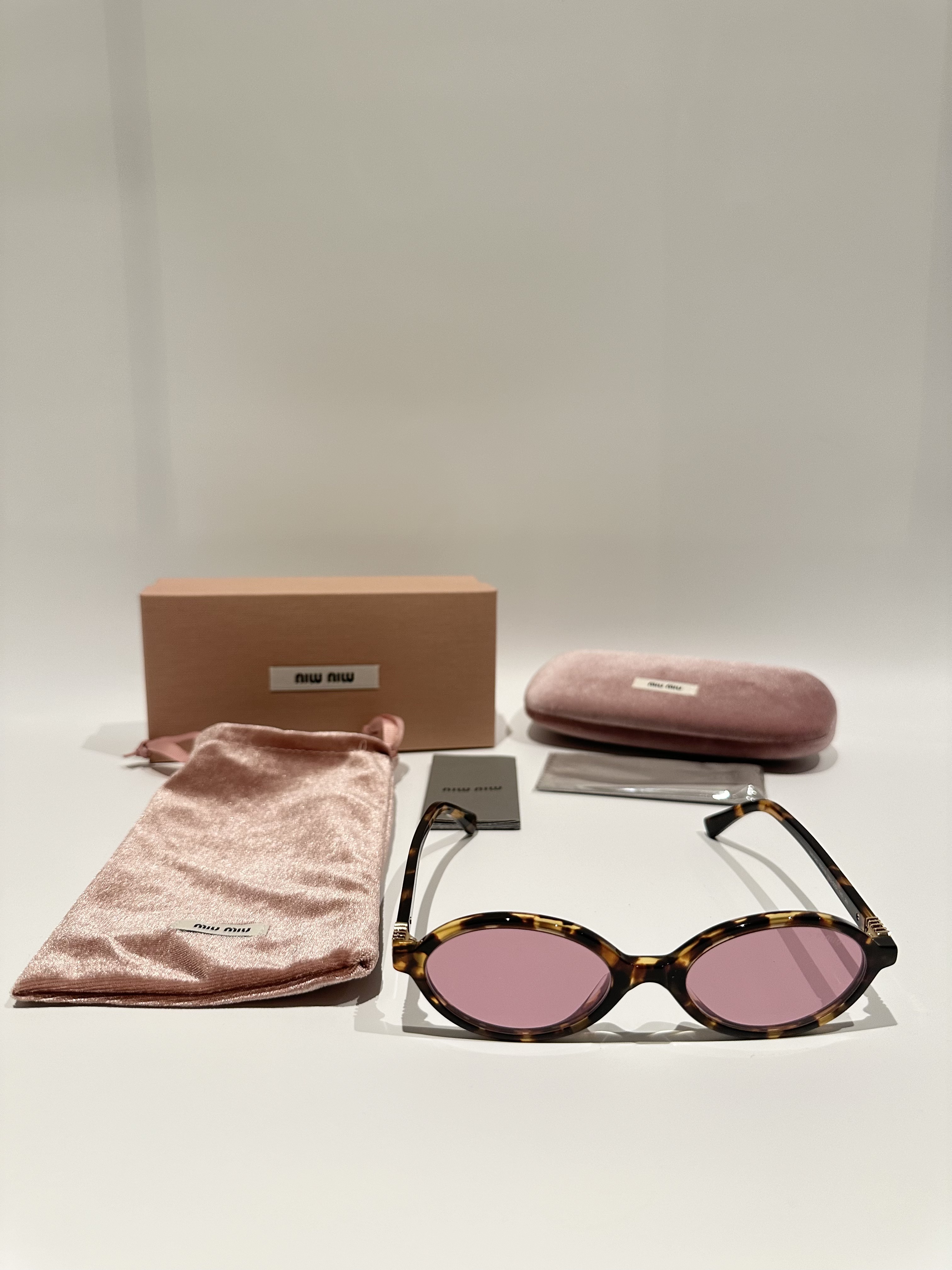 Miu Miu soft oval design sunglasses 04ZS Regard Amaranth lenses