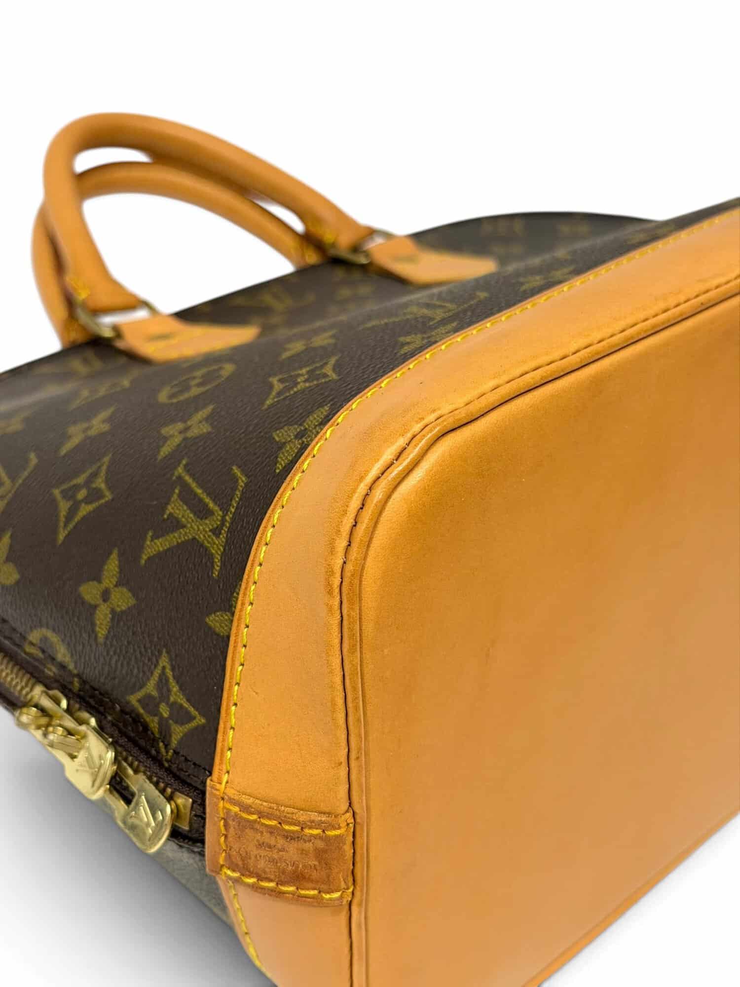 Louis Vuitton Brown Alma PM Monogram Canvas Handbag - Image 8